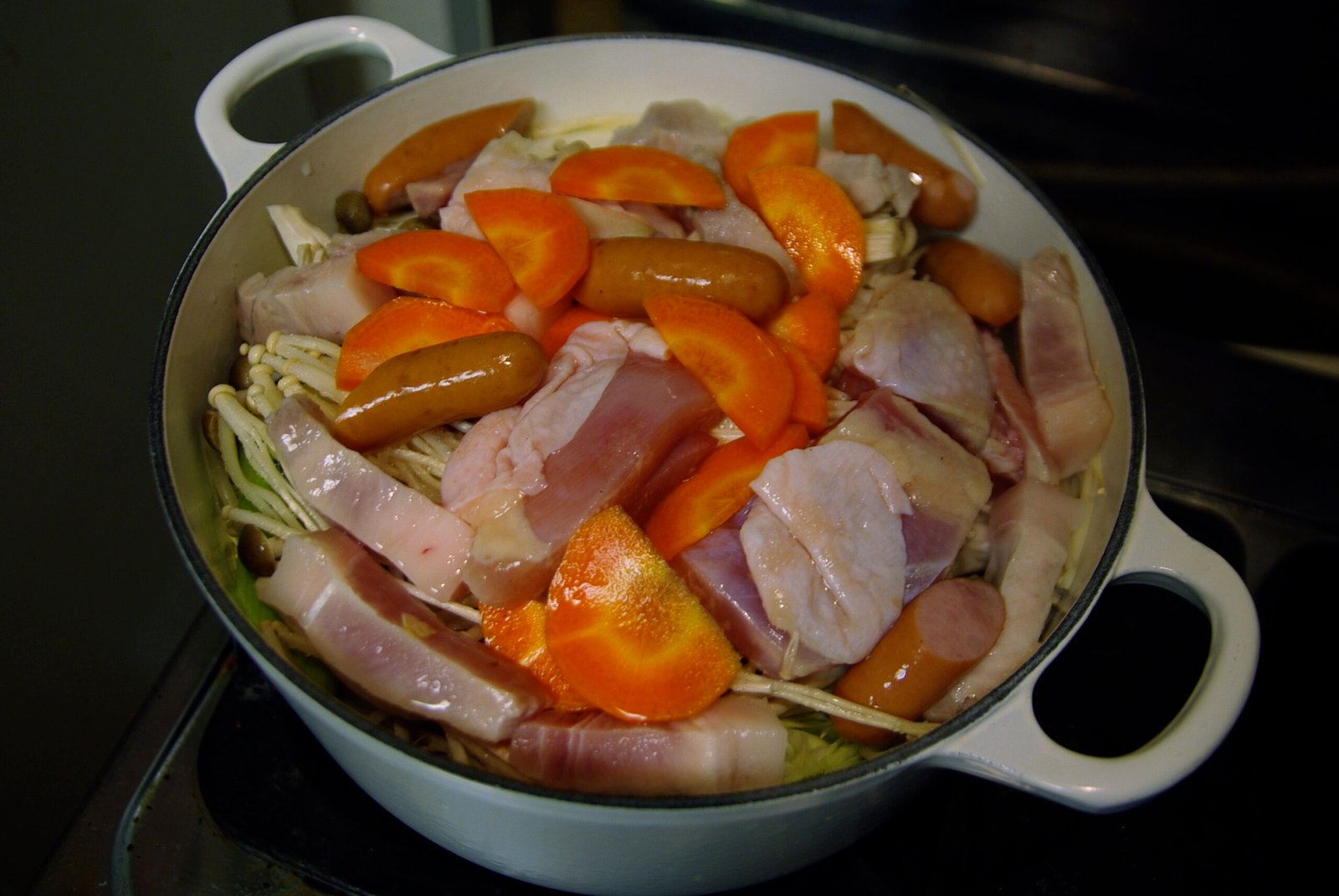 Japanese nabe hot pot with cabbage and vegetables simmering