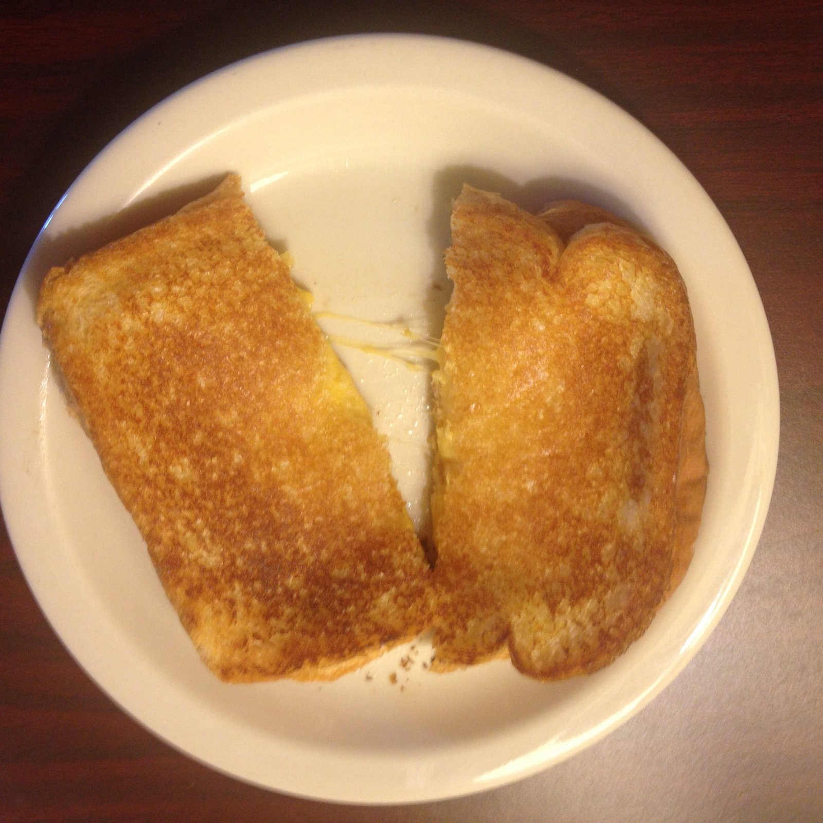 A real grilled cheese sandwich — the food Sims eat obsessively in The Sims 4 Grilled Cheese Aspiration