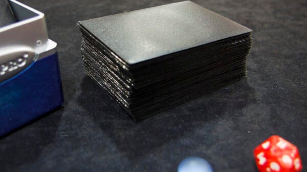 The Economics Behind Rare Magic: The Gathering Cards Magic: The Gathering cards and deck laid out at a Legacy Tournament