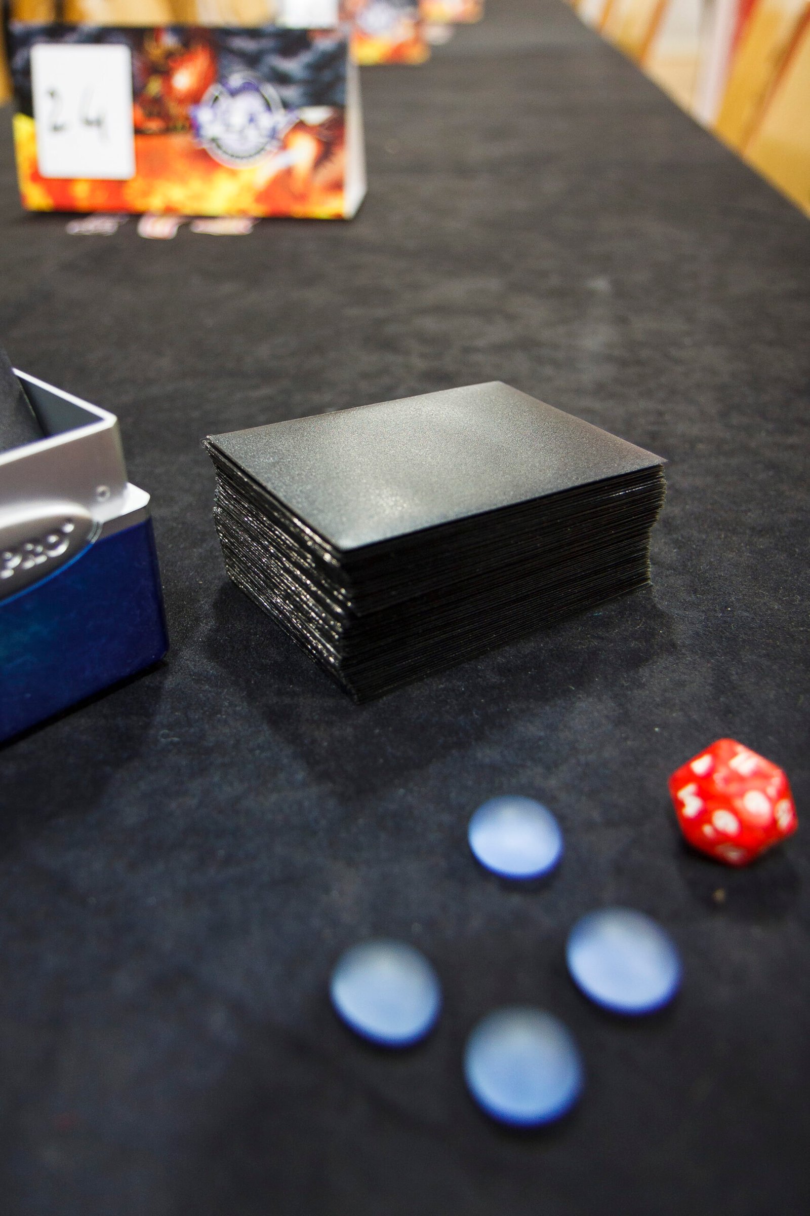 Magic: The Gathering cards and tokens laid out at a Legacy Tournament in Rouen, France