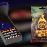 Forged Dice Co. Citadel dice tray and tower with dice, and a Mystery Metal dice pack