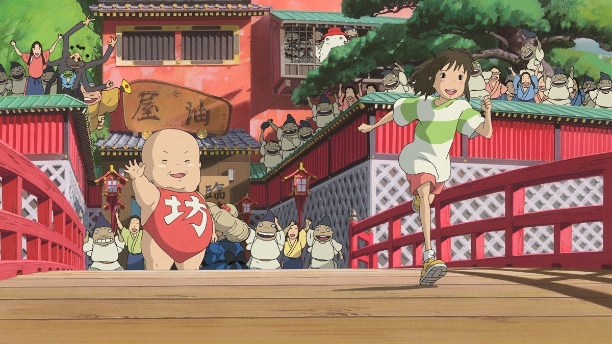 Chihiro running across the bridge to the bathhouse in Spirited Away