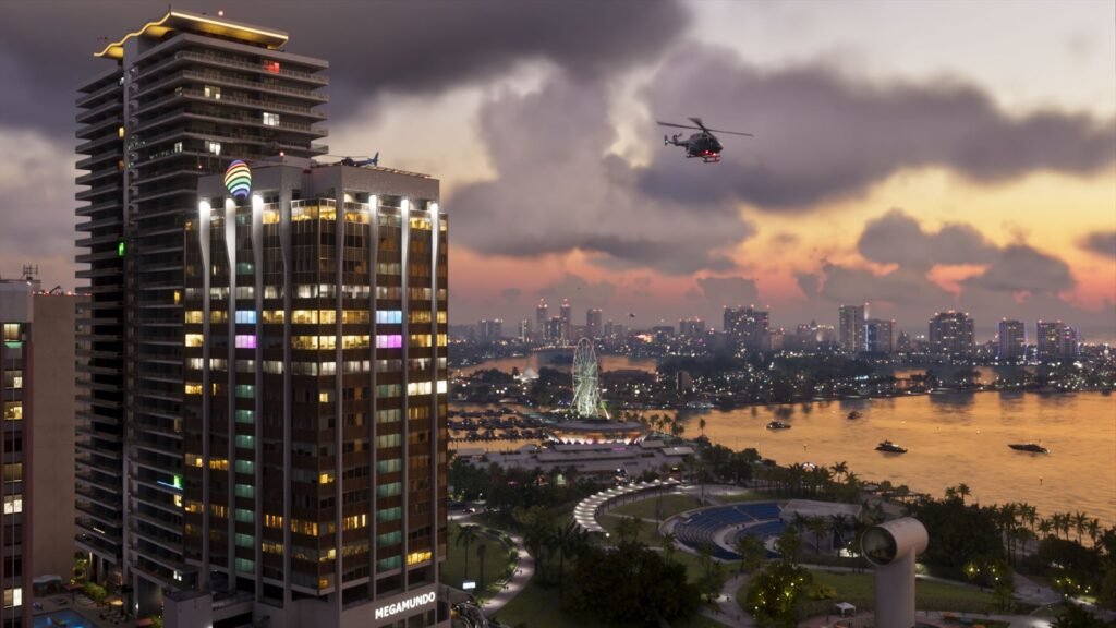 Official GTA 6 screenshot of the Vice City skyline at sunset with a helicopter overhead