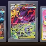 Mega Charizard X ex, Mega Gengar ex and Pikachu ex Special Illustration Rare cards in clear holders on a lit display shelf