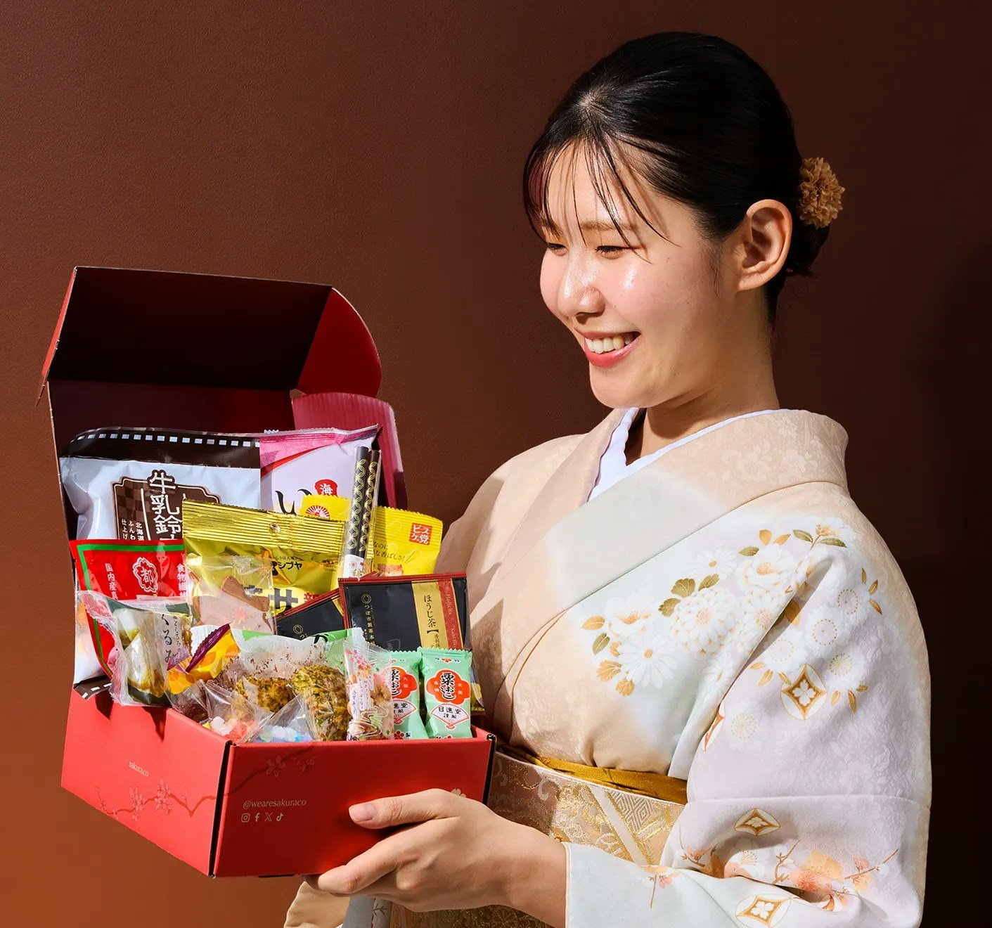 Opened Sakuraco November 2026 box with castella, Miyako Konbu, awa okoshi, hojicha and chopsticks inside