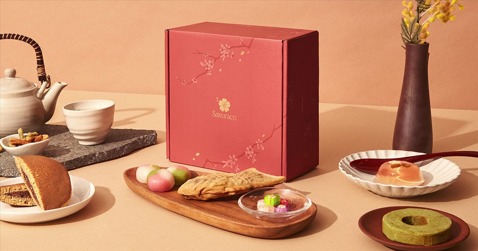 Official Sakuraco snack box with dorayaki, mochi, taiyaki, candy and green tea